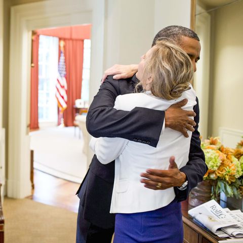 Kathryn Ruemmler and President Obama hug