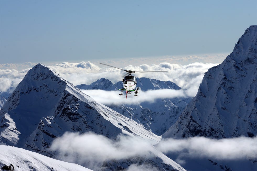 helicopter transfer on a swisskisafari trip in the alps