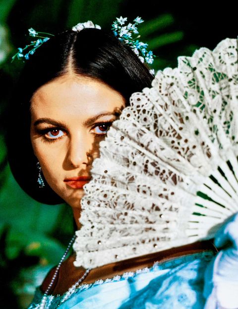 Green, Beauty, Skin, Fashion accessory, Turquoise, Hand fan, Headpiece, Lace, Feather, Photography, 