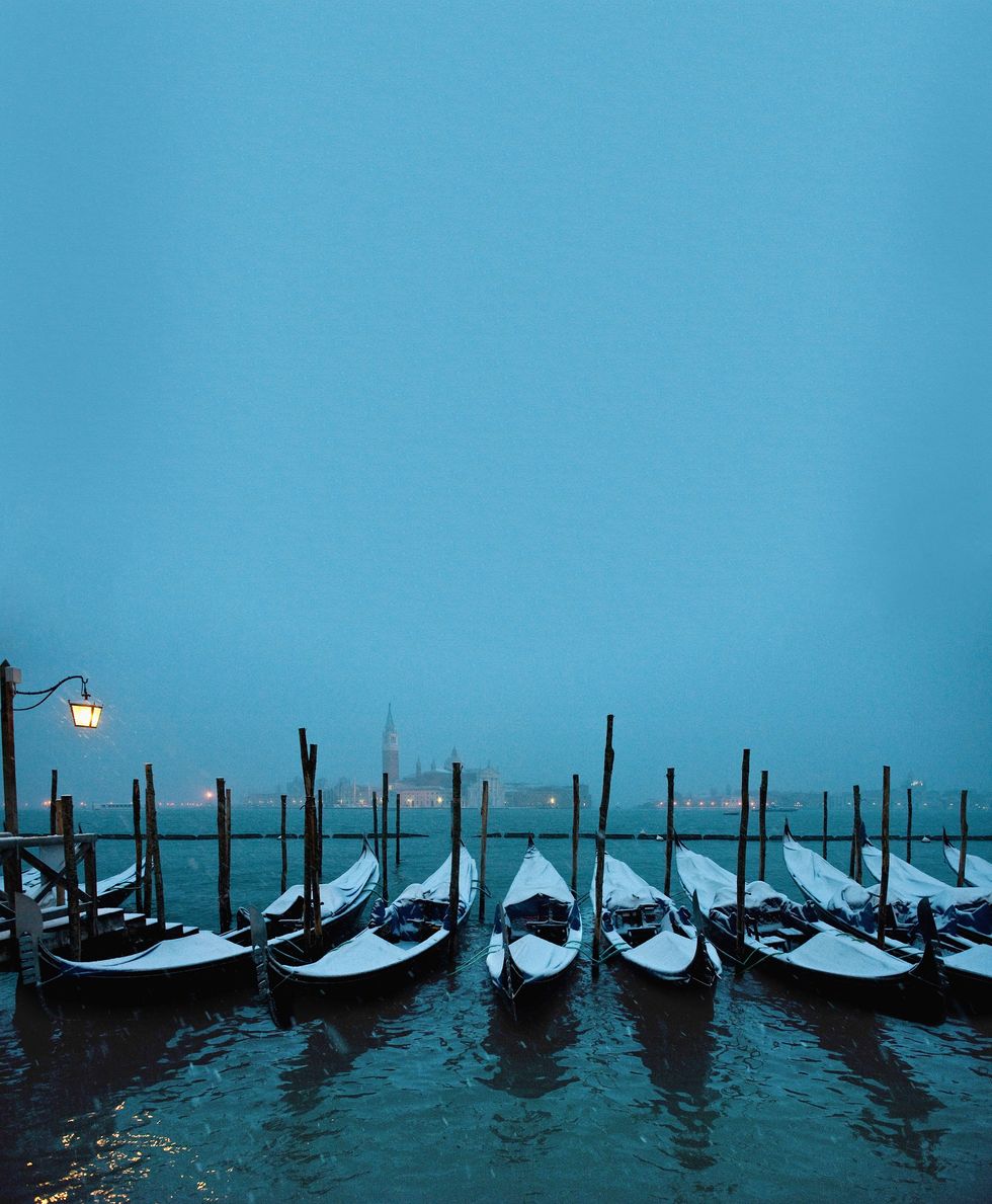 venice, italy   december 17  gondolas covered with snow in san marco on december 17, 2010 in venice, italy snow has fallen across much of europe today and is expected to continue over the weekend, causing traffic chaos and disrupting christmas deliveries  photo by marco secchigetty images