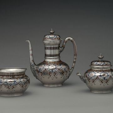 a few teapots and a pitcher