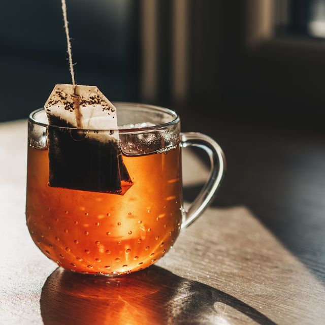 tea bag put in transparent glass teacup