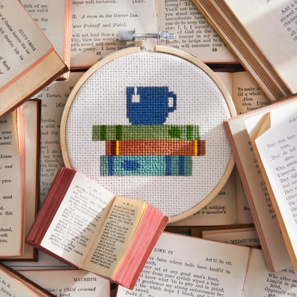 books and teacup cross stitch pattern