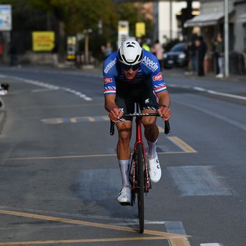 team alpecin's mathieu van der poel rides in the last kilometer on his way to win the milan sanremo one day classic cycling race on march 18, 2023