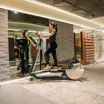 a person standing on a treadmill