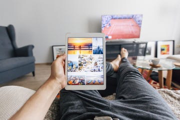 Room, Product, Living room, Furniture, Electronic device, Gadget, Technology, Hand, Table, Computer, 