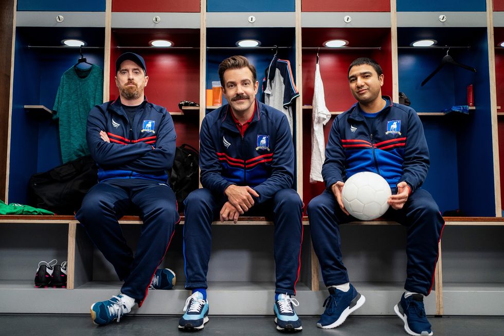 ted lasso season 2  brendan hunt as coach beard, jason sudeikis as ted lasso and nate mohammed as coach nate
