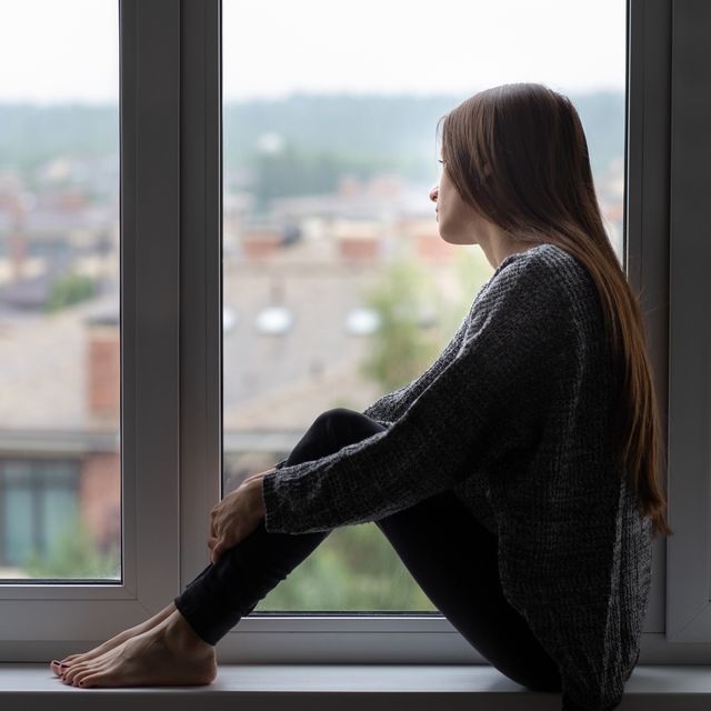 teen abuse,teenager has depression,a young girl is unhappy,upset, looks out the window