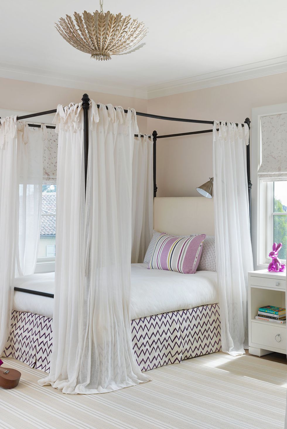 teenager bedroom with canopy bed