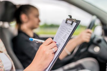 Getting a driving lesson in the car