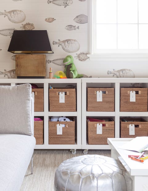 kids room with organizer bins and metallic pouf