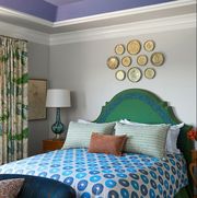 Room, Interior design, Green, Bed, Lighting, Bedding, Wall, Textile, Furniture, Ceiling, 