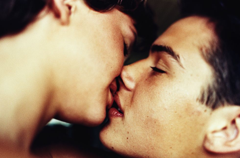 teenage couple kissing, closeup