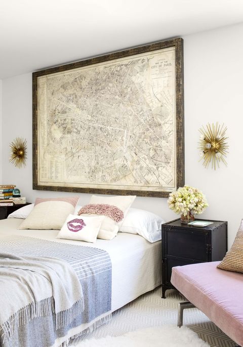 teen girl bedroom with big map over bed