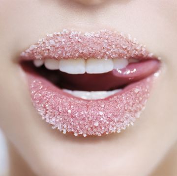 teenage girl 16 18 lips with sugar, close up