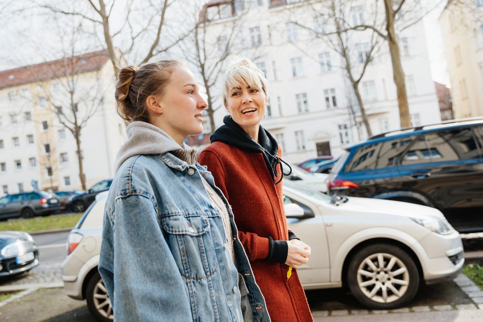 teenage girl out for walk with mom
