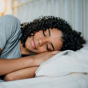 woman sleeping in bed