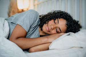 woman sleeping in bed