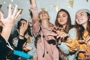 teenagers celebrating new years eve