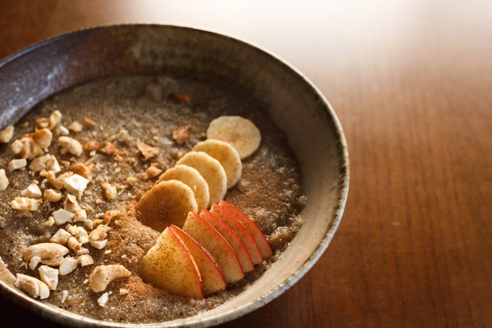 Super Food - Morning Breakfast Teff Porridge Nuts and Fruits on Top