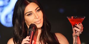 Kim Kardashian Raises Toast For Elizabeth Taylor Foundation/World AIDS Day At The Abbey