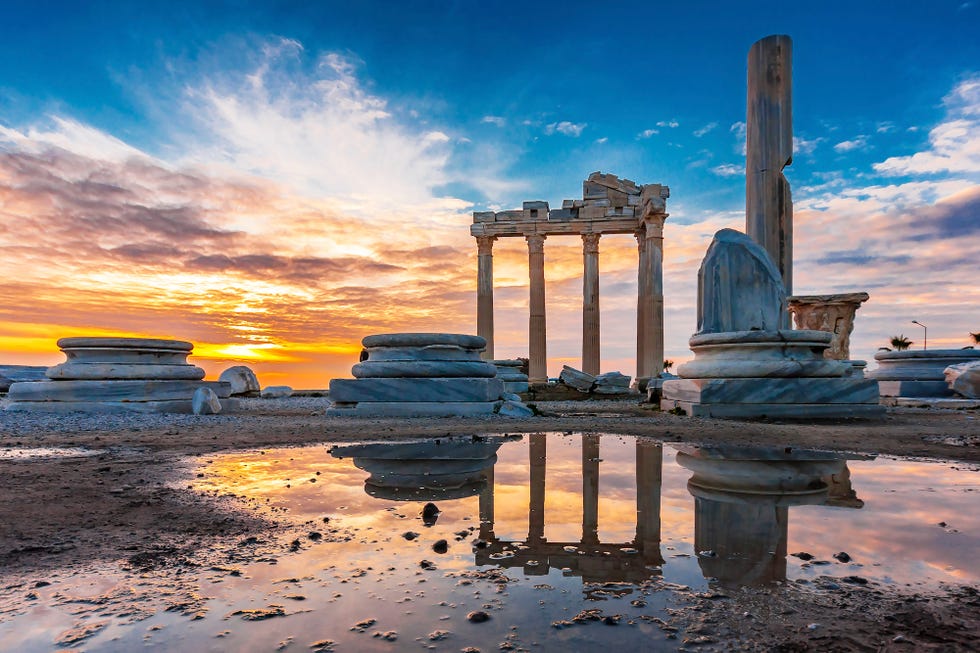 a group of pillars in the water