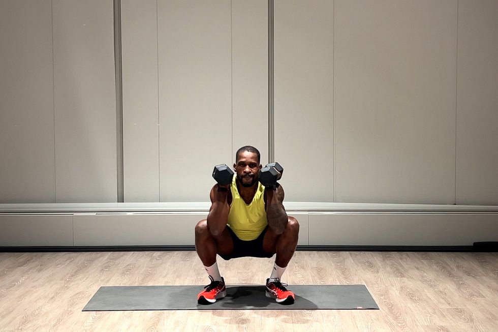 glutes and hamstrings workout, tempo squat with half lift