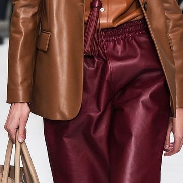 Clothing, Leather, Fashion, Fashion model, Brown, Leather jacket, Outerwear, Haute couture, Jacket, Textile, 