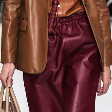 Clothing, Leather, Fashion, Fashion model, Brown, Leather jacket, Outerwear, Haute couture, Jacket, Textile, 