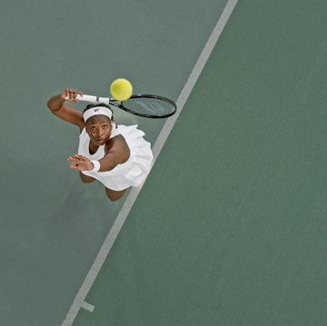 tennis player playing in tennis court