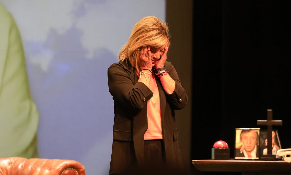 person expressing emotion during a presentation or performance