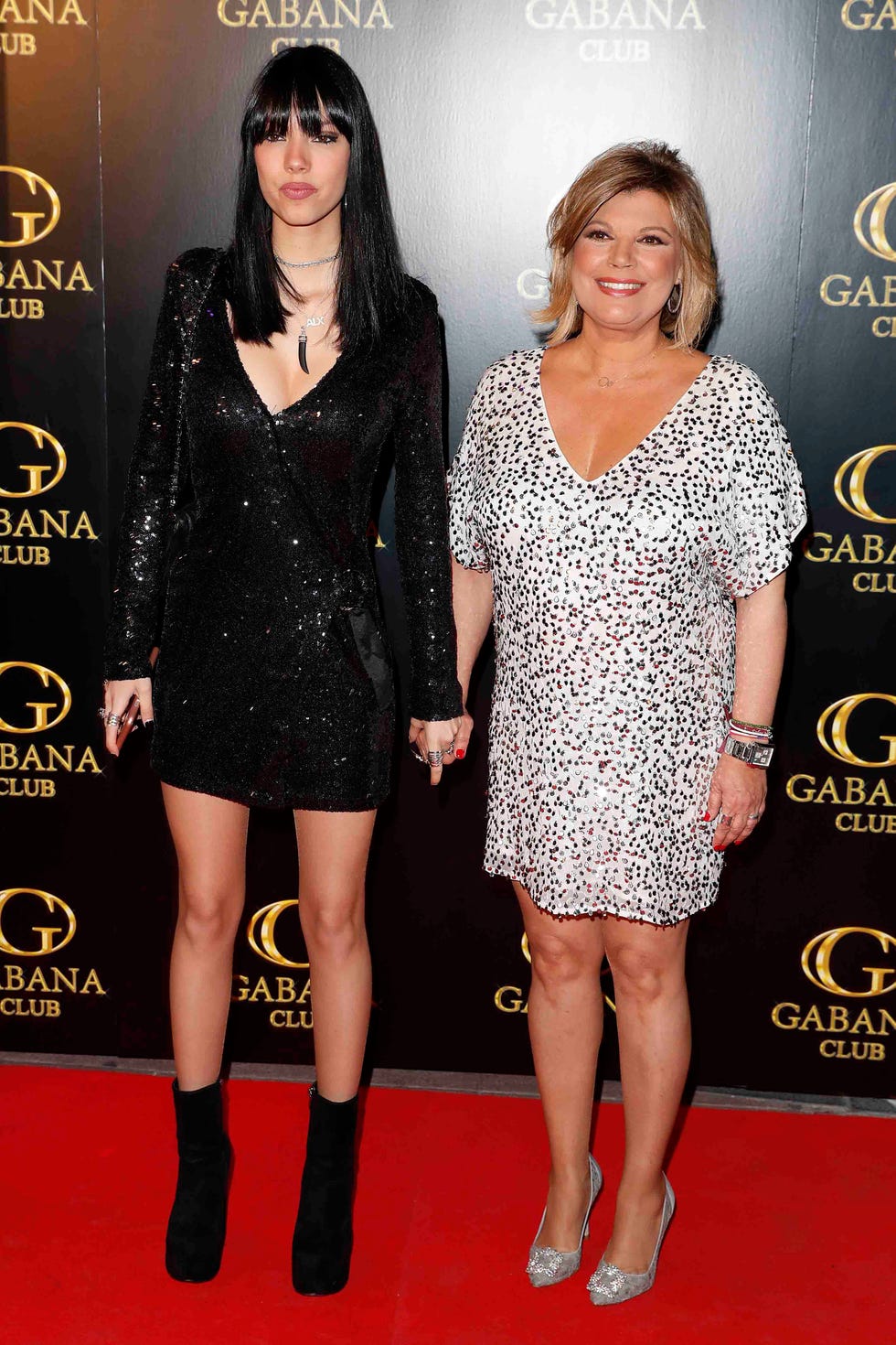 Red carpet, Clothing, Carpet, Cocktail dress, Little black dress, Dress, Fashion, Flooring, Premiere, Footwear, 