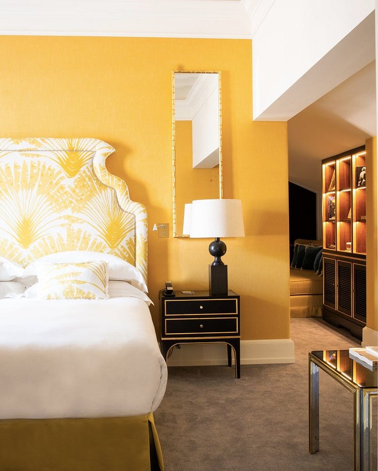 luxurious hotel room with bright decor and modern furnishings luxurious hotel room with bright decor and modern furnishings