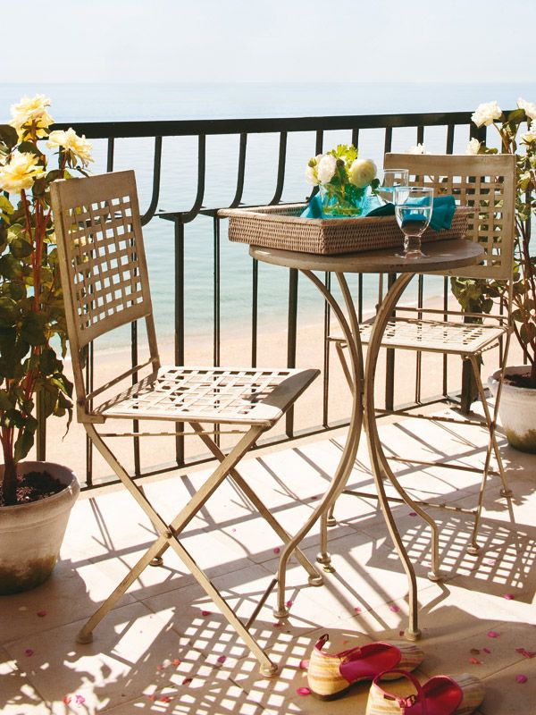 Table, Furniture, Outdoor furniture, Outdoor table, Flowerpot, Houseplant, Patio, Deck, Coffee table, Armrest, 