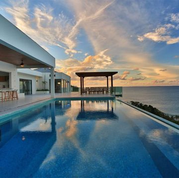 Swimming pool, Sky, Property, Resort, Architecture, Estate, Building, House, Real estate, Vacation, 