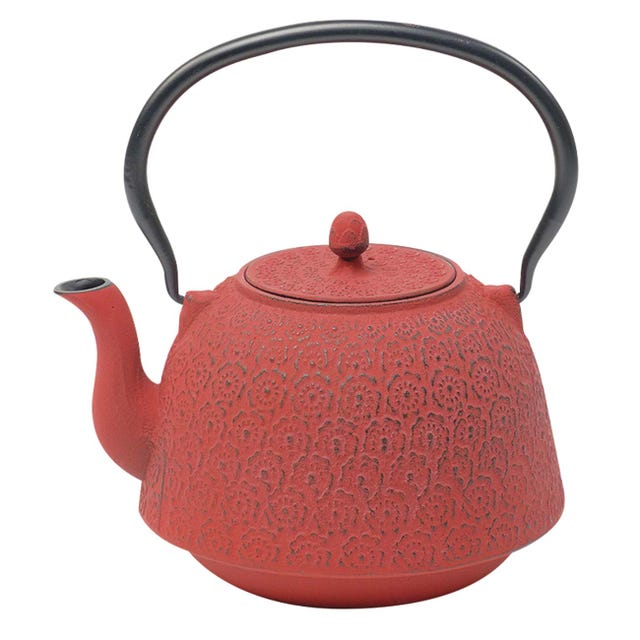 Tetera roja de hierro