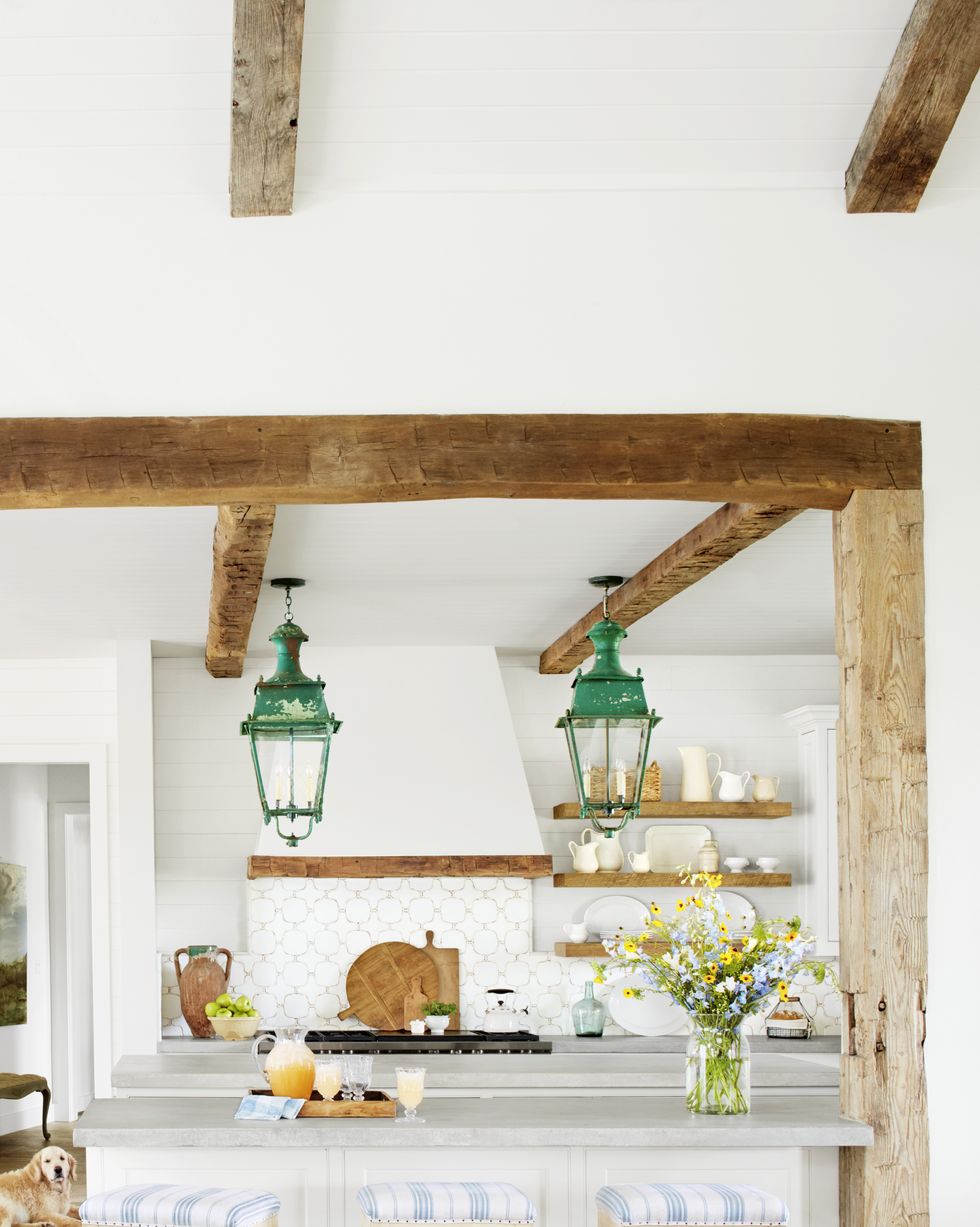white farmhouse kitchen with vintage green pendant lights