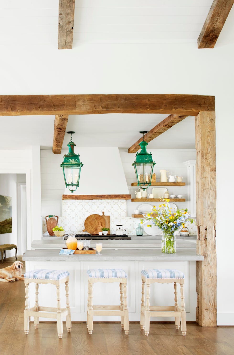 white farmhouse kitchen with vintage green pendant lights