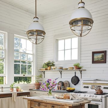texas hill country white farmhouse kitchen with duck on the ground