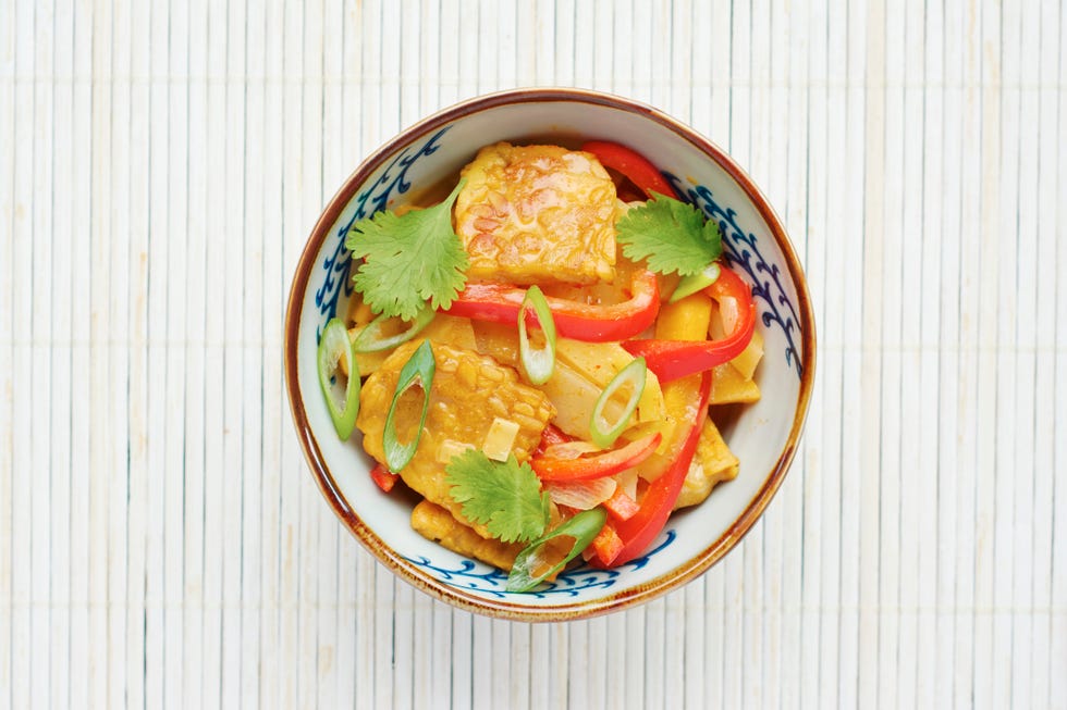 thai curried winter vegetables, parsnips, yellow beets, turnips, rutabaga, with tempeh on rice
