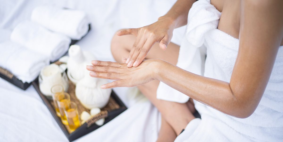 thai women having massage with massage oil at her hand