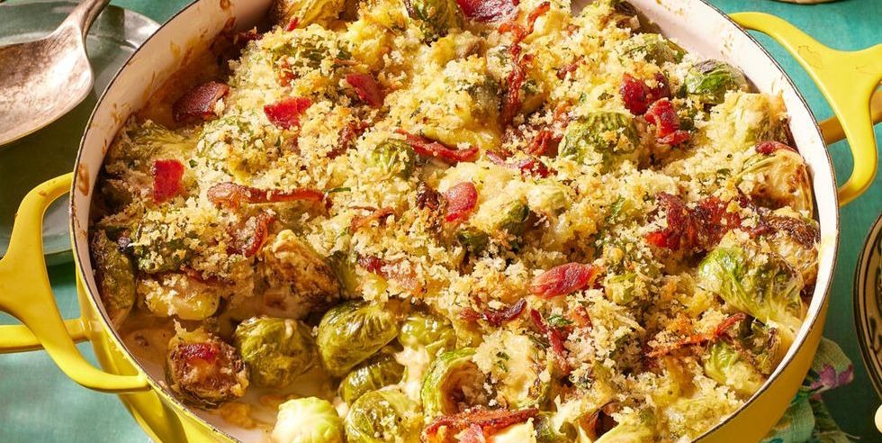 brussels sprouts casserole with bacon in yellow round baking dish