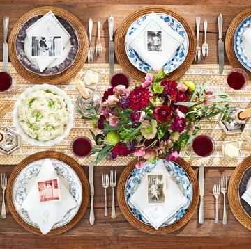 floral thanksgiving centerpiece, old family photos on plates as placecards