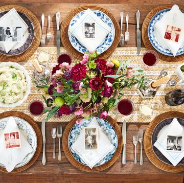 floral thanksgiving centerpiece, old family photos on plates as placecards