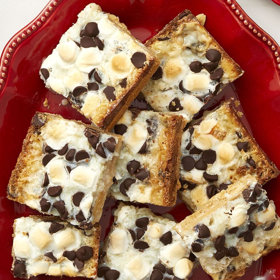 chocolate marshmallow cookie bars on red plate