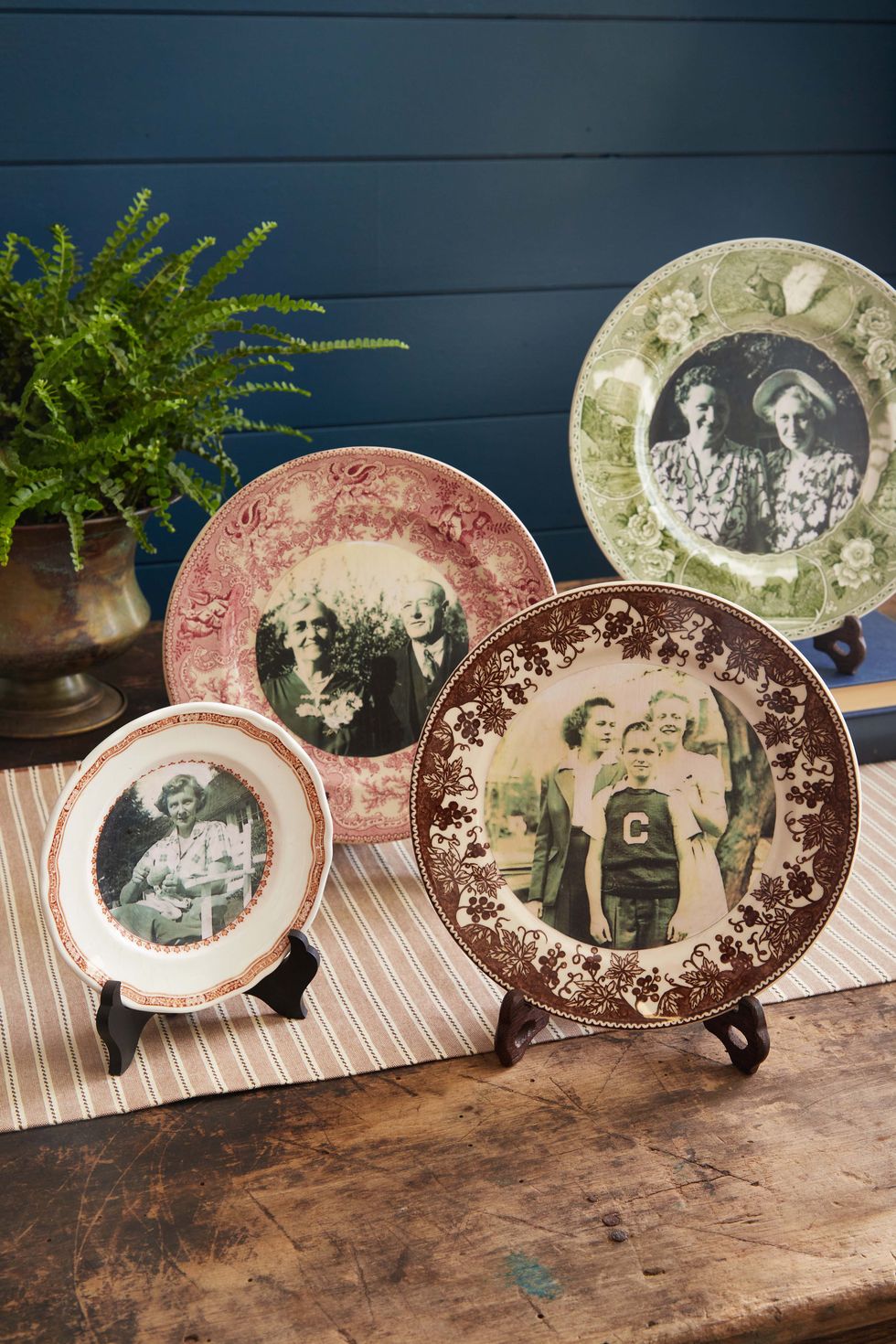 black and white photos decoupaged into the middle of decorative plates