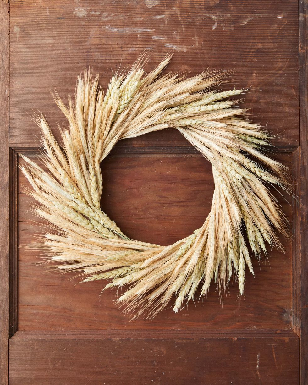 wreath made from dried wreath hung on a brown door