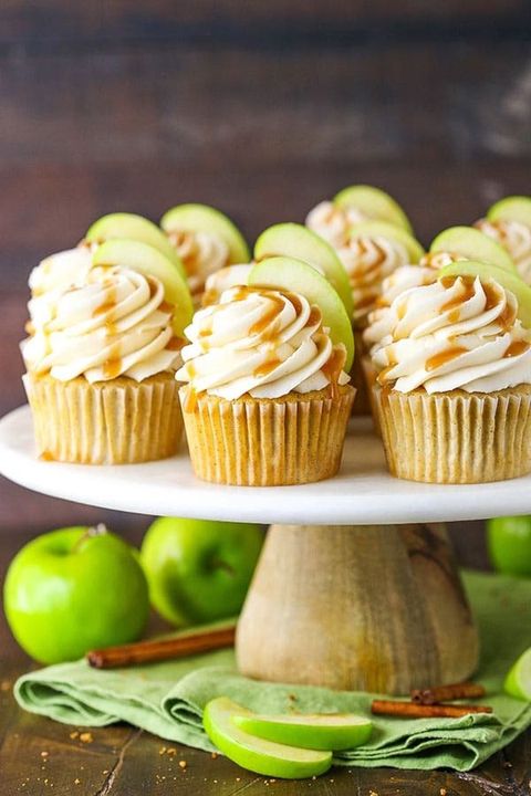 thanksgiving cupcakes caramel apple cupcakes on cake stand with apples and cinnamon