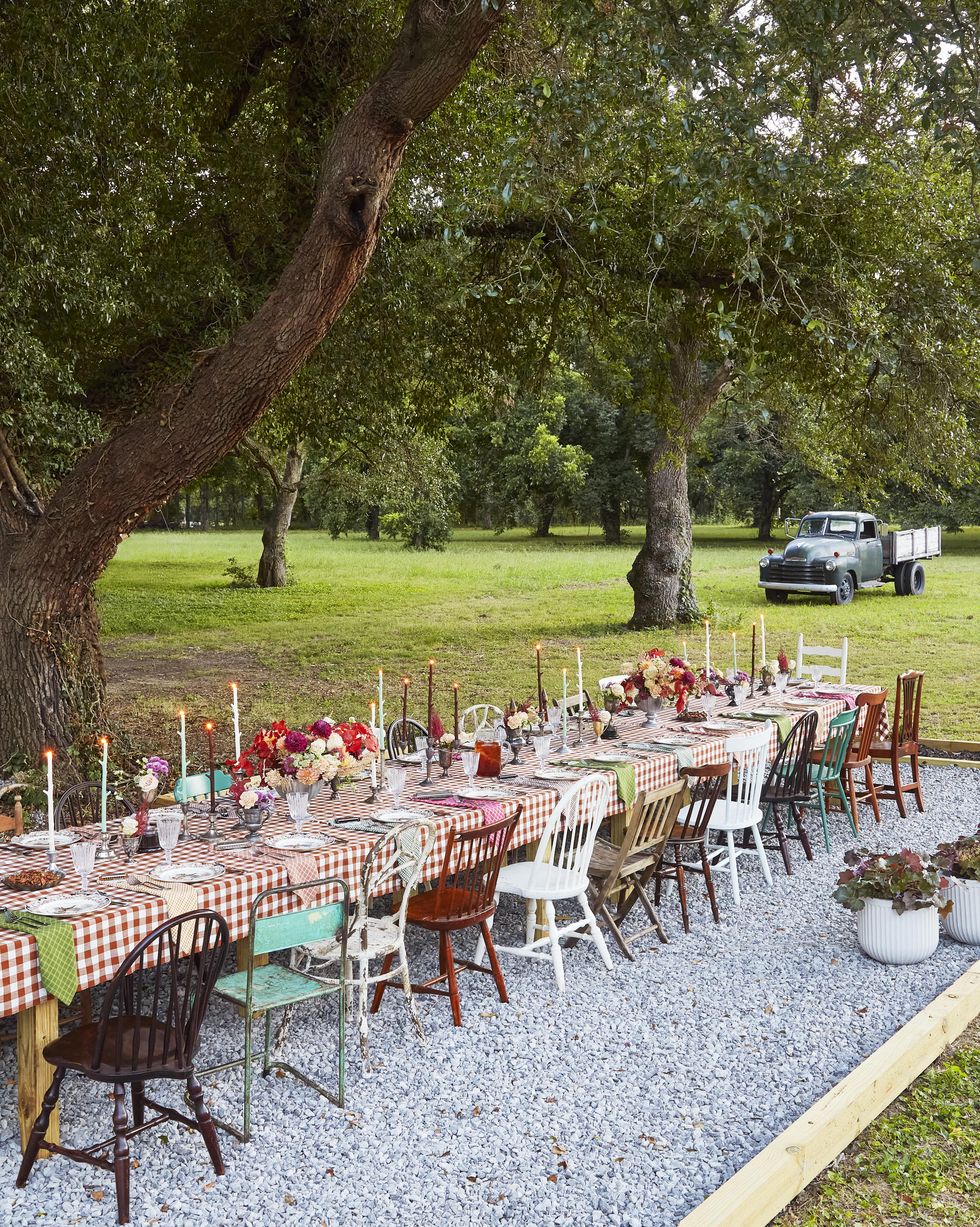 outdoor thanksgiving table with mismatched chairs