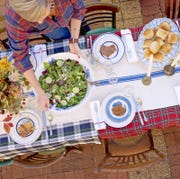 woman serving thanksgiving dinner